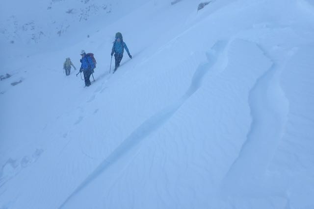 Large cracks in the soft redistributed snow on Ben Nevis.