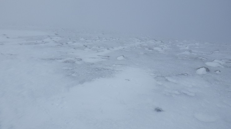 Areas of the plateau are covered in a layer of ice. 