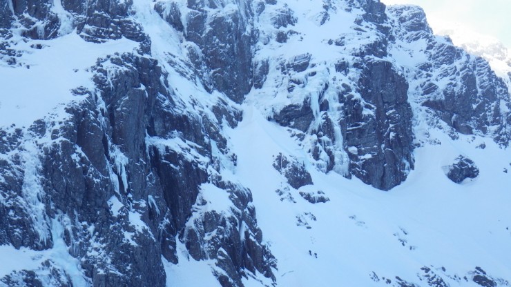 Climbers heading up to a route in the Trident Buttress area. Plenty of ice about. 