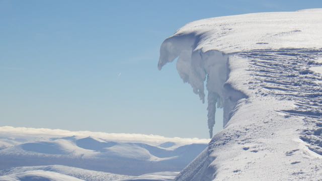 Large cornices may collapse as the weather warms in the next few days.