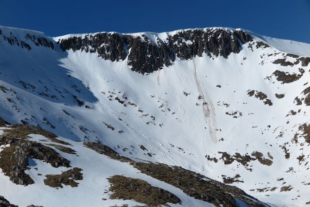 Coire an Lochan showing debris trails from collapsing cornices