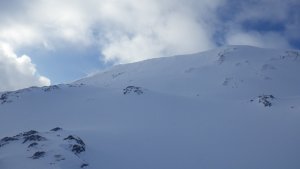 Snow showers and a bit less windy