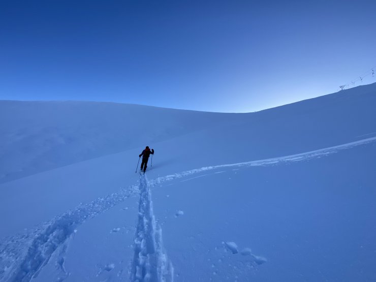 Heading up the Goose on fresh snow.