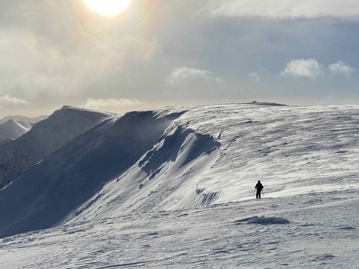 Looking across to the summit of Aonach Mor. Transported snow blowing onto Easterly aspects at this altitude.